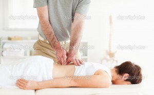 depositphotos 11189200-Brunette-woman-getting-a-back-massage   